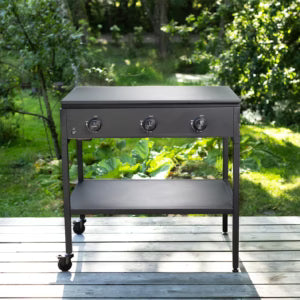 Infrared searing grill reaching 800 degrees cooking steak outdoors