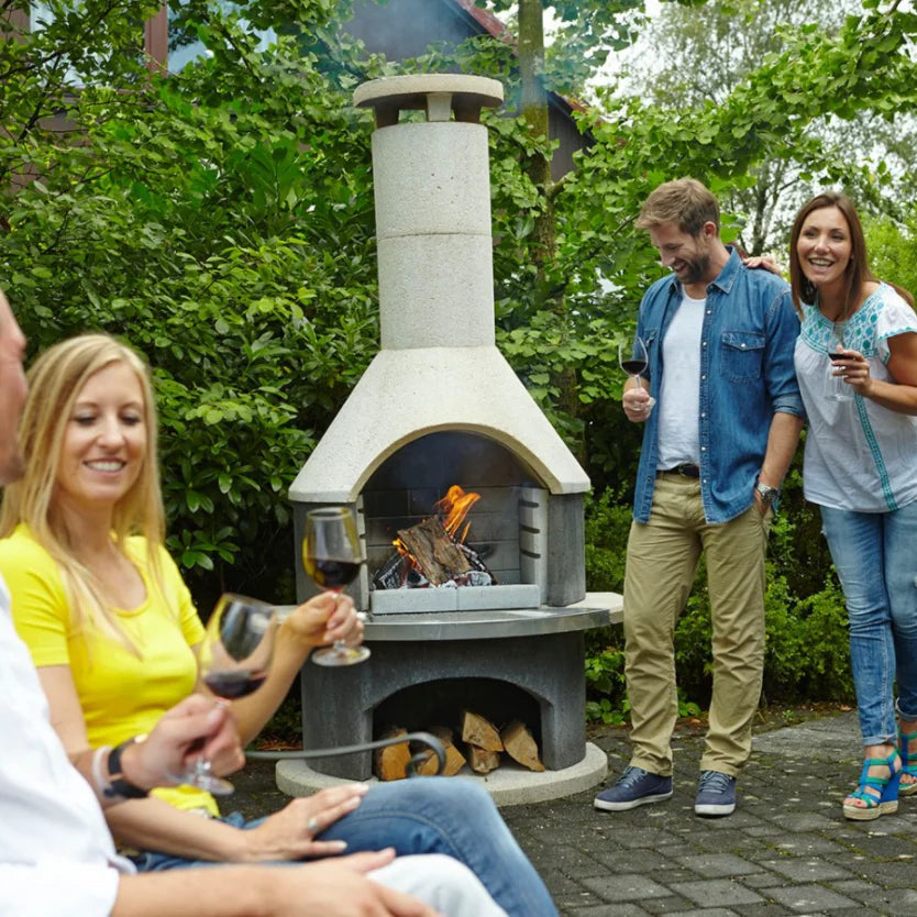 Buschbeck Wellington masonry barbecue with base in garden setting