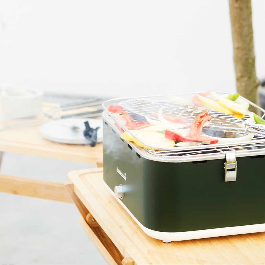 Portable charcoal BBQ grill for outdoor cooking UK