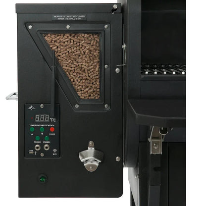 Pellet smoker with control panel and wood pellets inside, on a white background