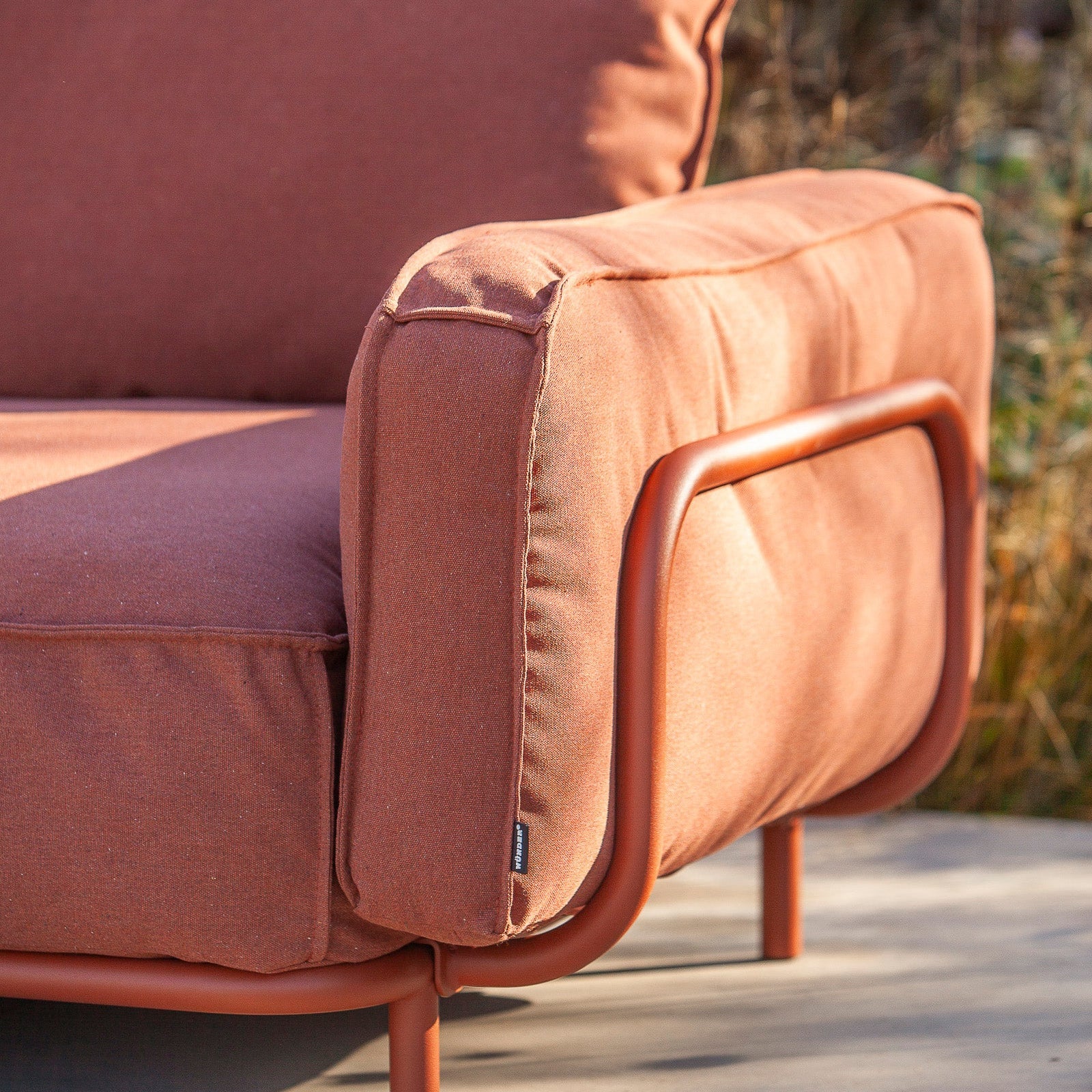 Relaxed patio lounge with footrest seat