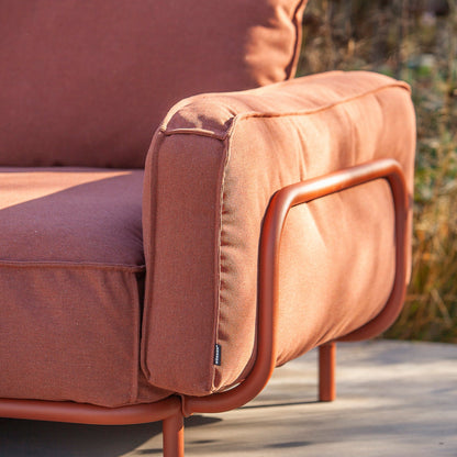 Relaxed patio lounge with footrest seat