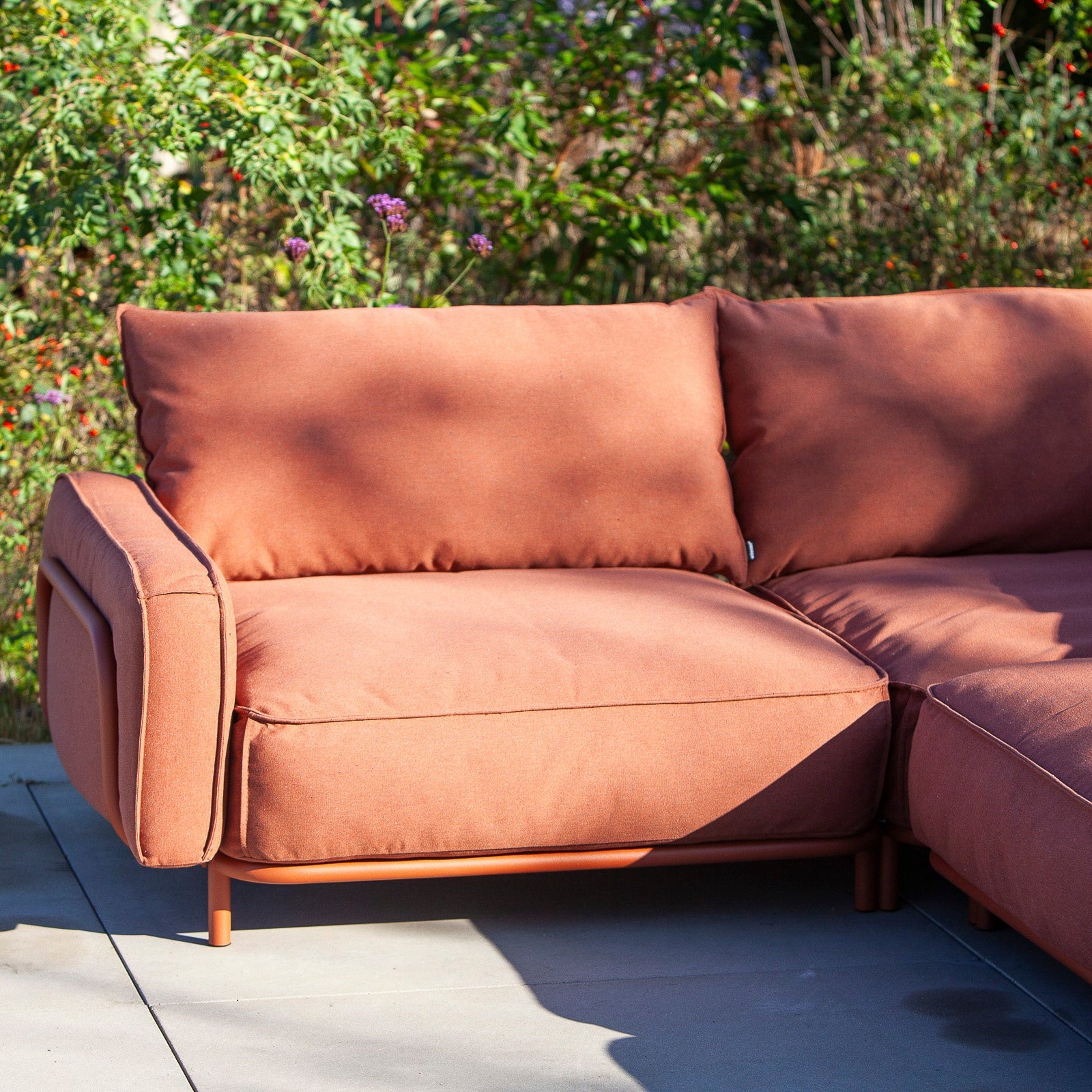 The Lounge base module outdoor lounge chair in garden